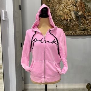 PINK hoodie with zipper in front. Adjustable hood.